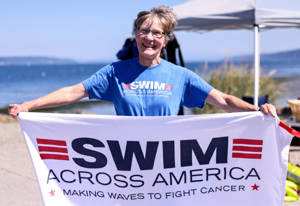 How are North Sound swimmers contributing to cancer research?