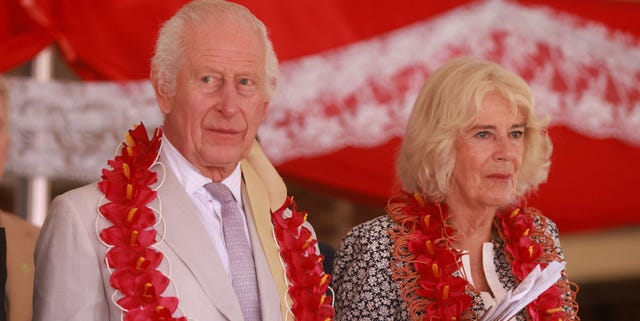King Charles III and Queen Camilla during their visit to the Soukya Holistic Health Center in Bangalore, India.
